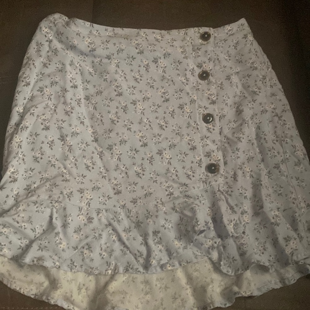 A blue with white flower skirt